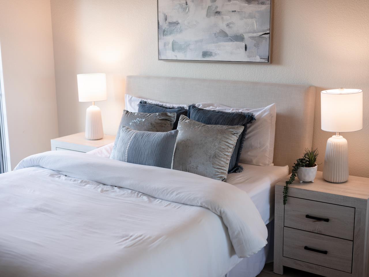 160 Seascape Ridge Drive Aptos, CA 95003 - Photo 47 of 61 a bedroom with a bed and a lamp with the dresser