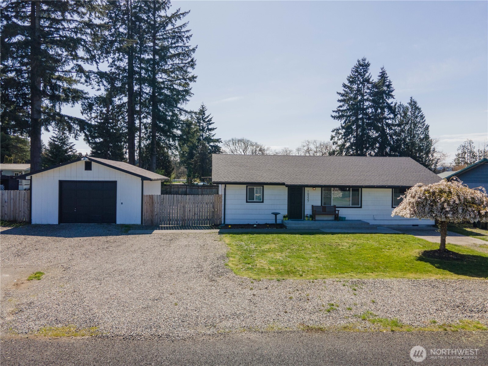 10327 185th Avenue Southwest Rochester, WA 98579 - Photo 1 of 27 a house view with a garden space