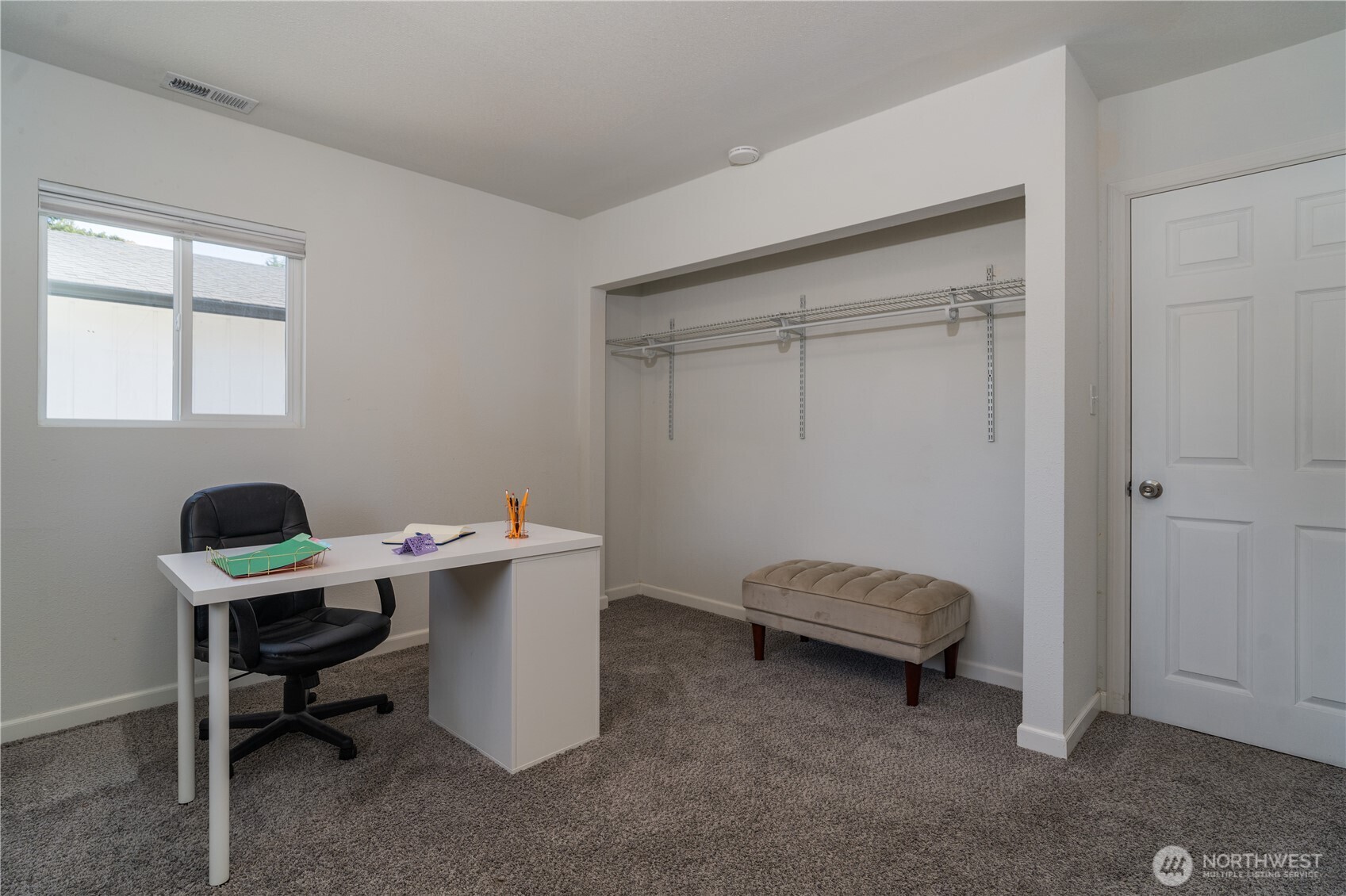 10327 185th Avenue Southwest Rochester, WA 98579 - Photo 16 of 27 a bedroom with a workspace