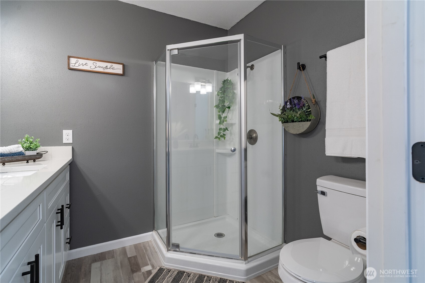 10327 185th Avenue Southwest Rochester, WA 98579 - Photo 22 of 27 a bathroom with a shower a toilet and a sink