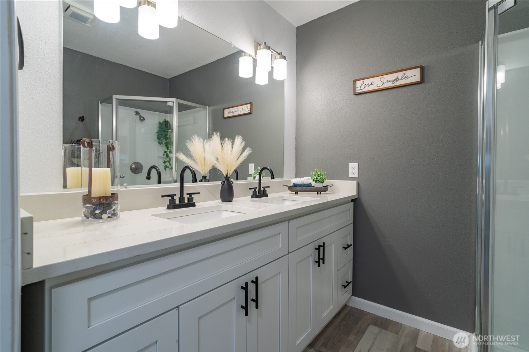 10327 185th Avenue Southwest Rochester, WA 98579 - Photo 23 of 27 a bathroom with a double vanity sink and a mirror