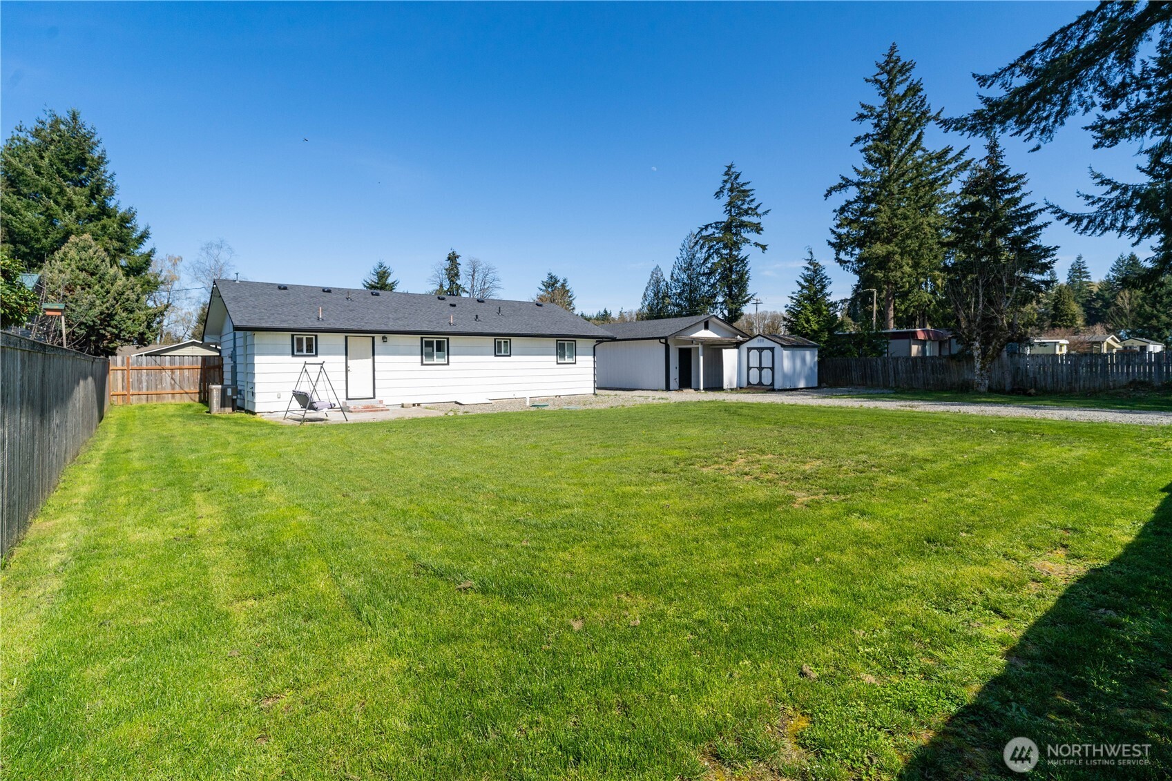 10327 185th Avenue Southwest Rochester, WA 98579 - Photo 26 of 27 a view of a house with a big yard