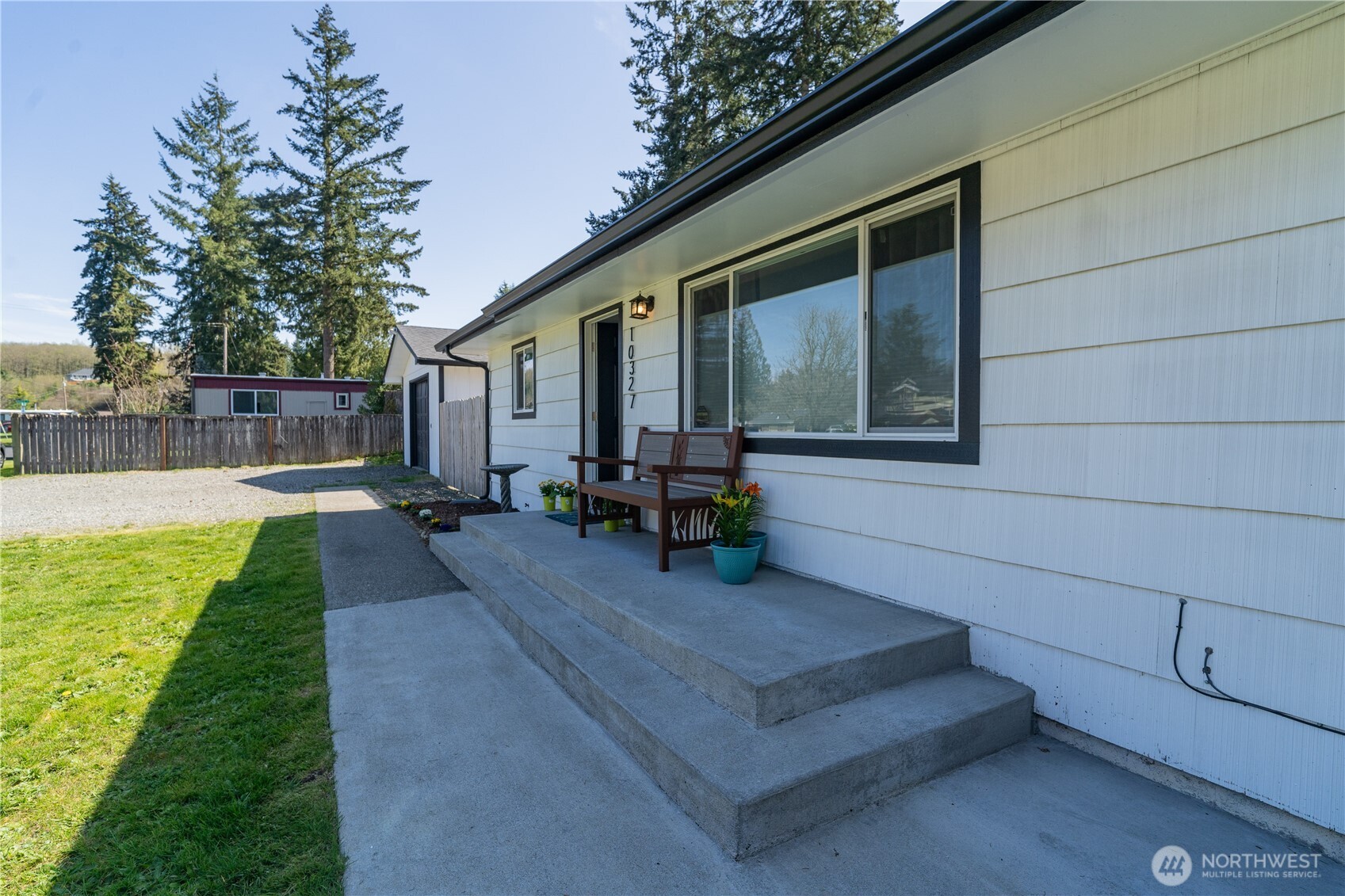 10327 185th Avenue Southwest Rochester, WA 98579 - Photo 5 of 27 a view of a house with backyard and sitting area