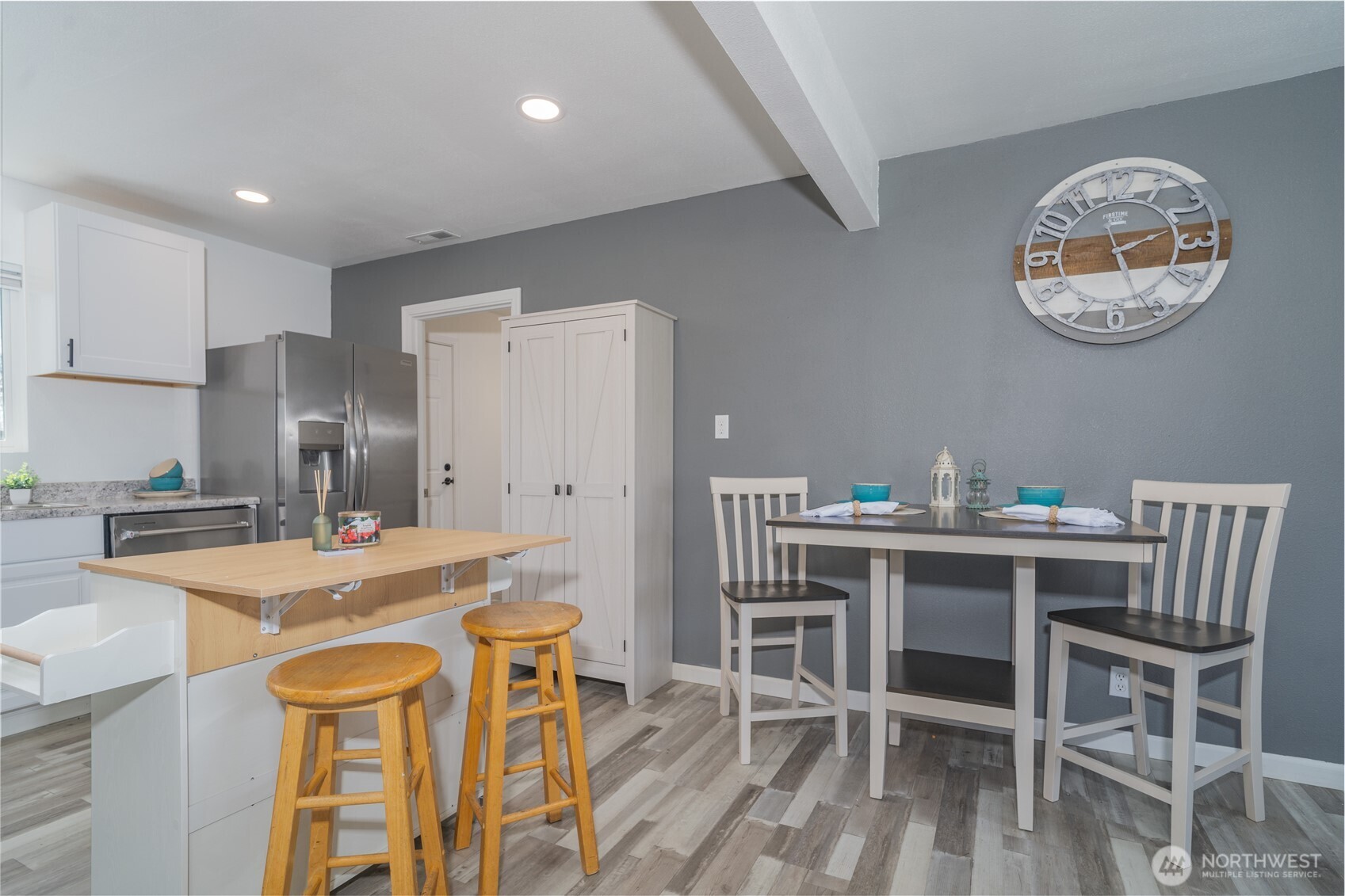 10327 185th Avenue Southwest Rochester, WA 98579 - Photo 8 of 27 a kitchen with a table and chairs in it