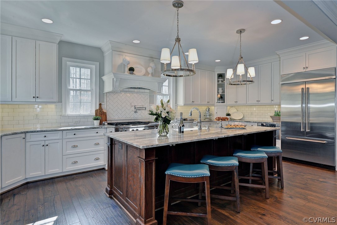 3419 Westport Williamsburg, VA 23188 - Photo 14 of 50 a kitchen with a sink stove and wooden floor