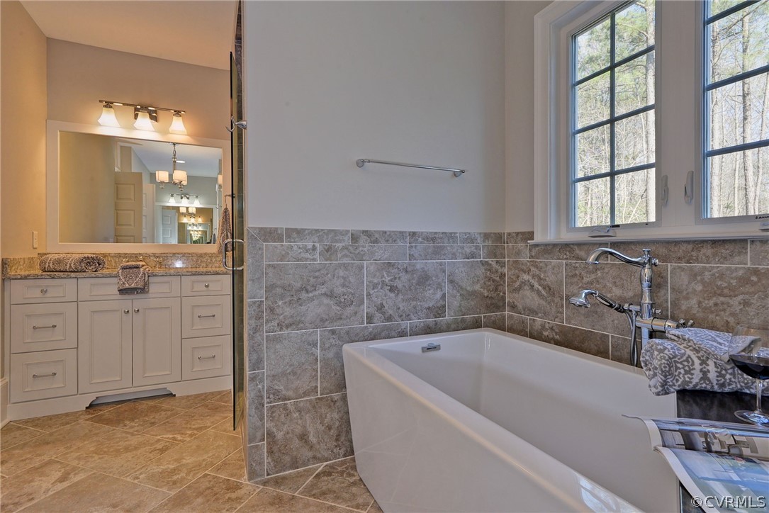 3419 Westport Williamsburg, VA 23188 - Photo 27 of 50 a bathroom with a bathtub and a sink