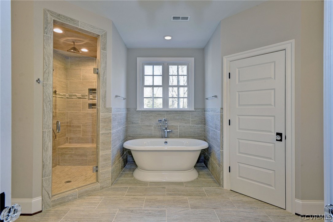 3419 Westport Williamsburg, VA 23188 - Photo 34 of 50 a spacious bathroom with a bathtub and shower