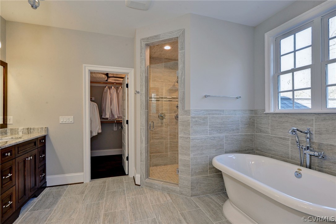 3419 Westport Williamsburg, VA 23188 - Photo 35 of 50 a bathroom with a bathtub and a sink