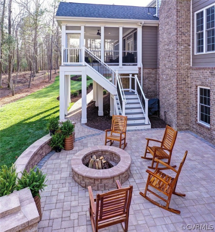 3419 Westport Williamsburg, VA 23188 - Photo 42 of 50 a view of a chairs and fire pit in the patio with a yard