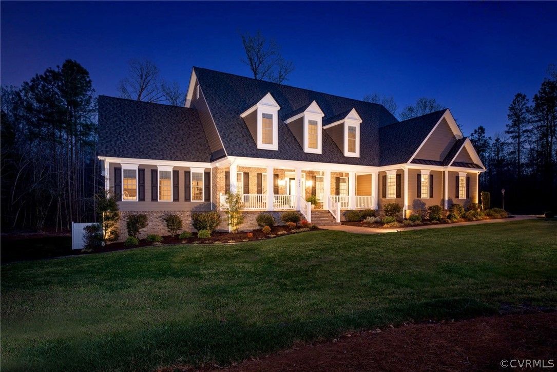 3419 Westport Williamsburg, VA 23188 - Photo 48 of 50 a front view of a house with a garden