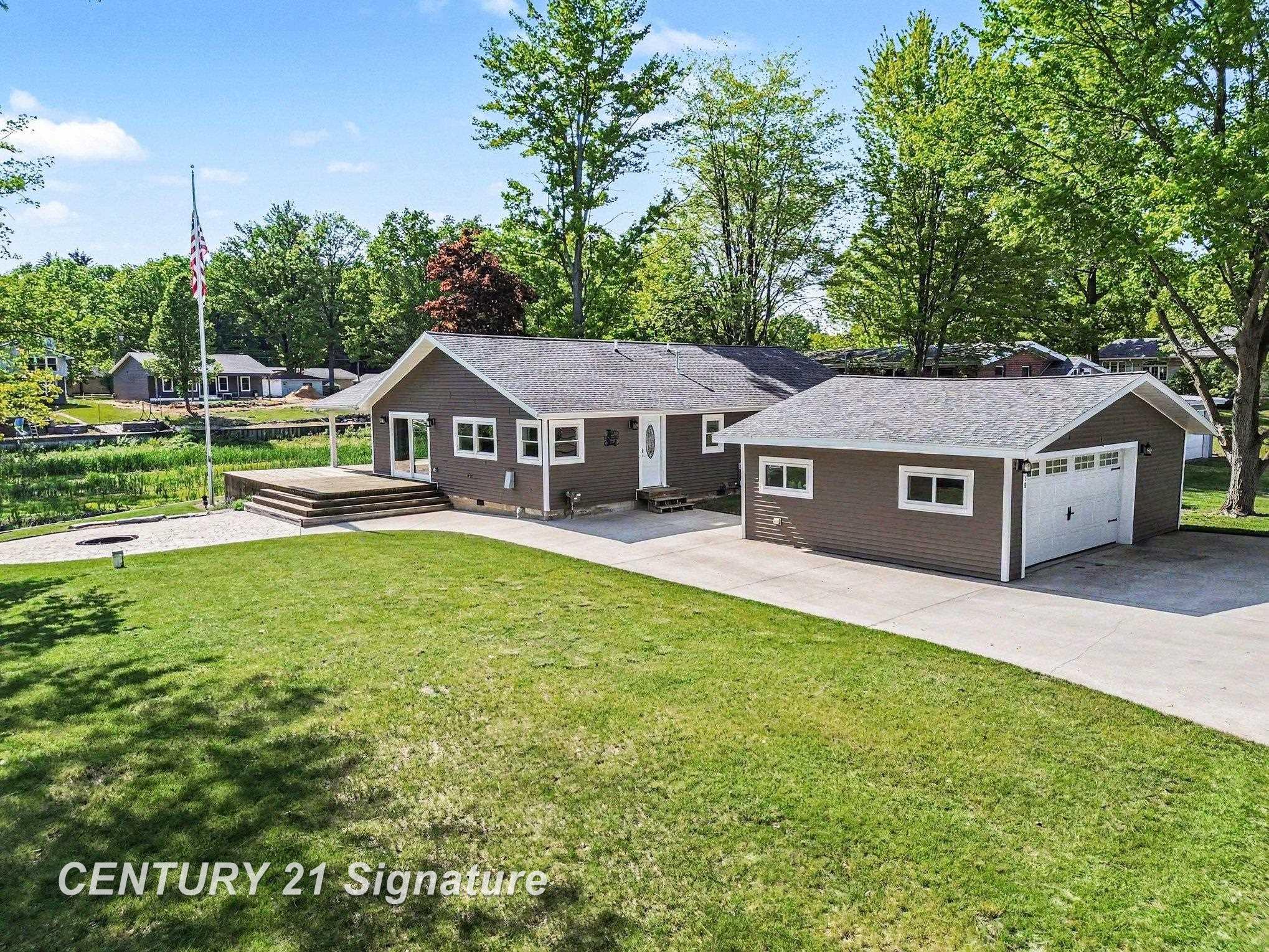 5458 Oakridge Road Beaverton, MI 48612 - Photo 1 of 25 50209482-ed7998eb-b023-4e63-a0a0-64facdbeff21.JPG