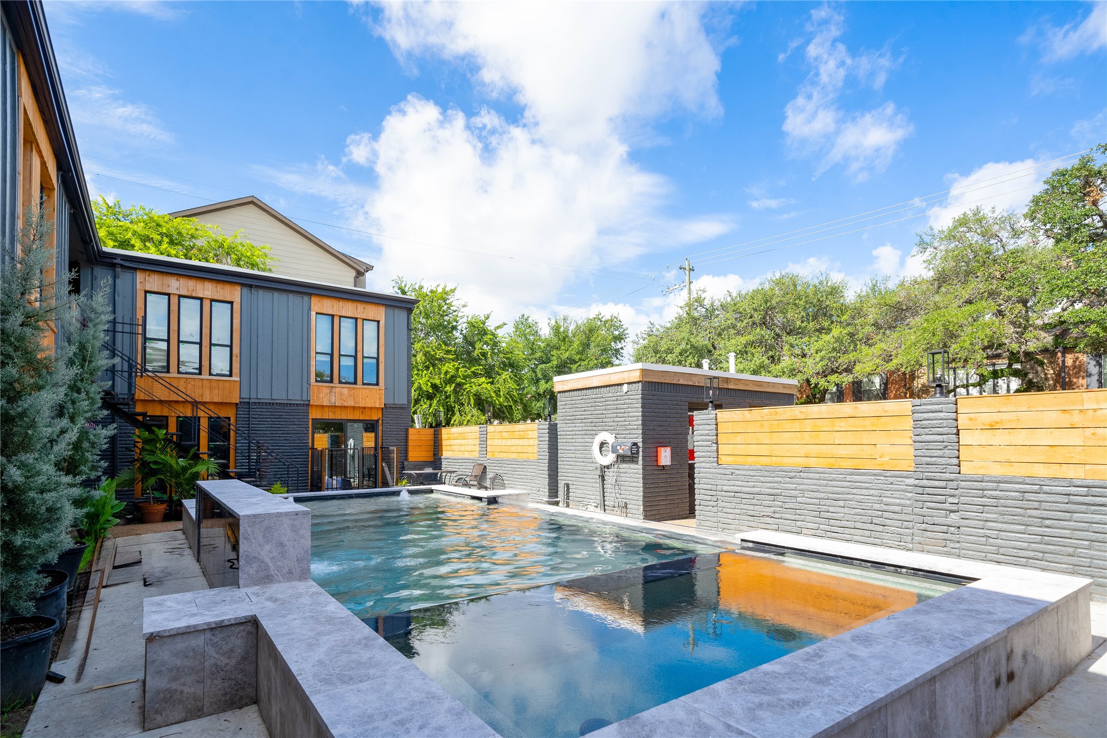 2703 Mason Street, Unit 1BD Houston, TX 77006 - Photo 16 of 19 swimming pool view with a garden space