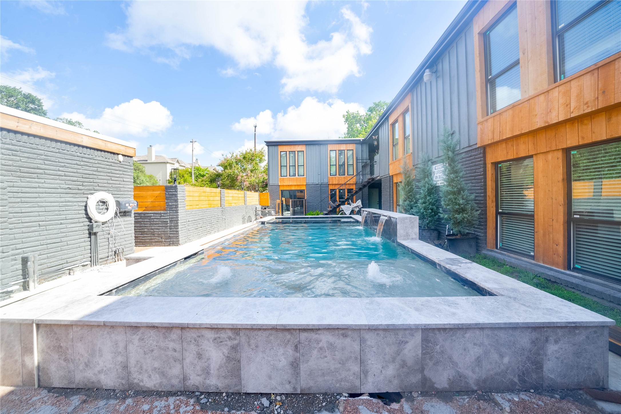 2703 Mason Street, Unit 1BD Houston, TX 77006 - Photo 2 of 19 swimming pool view with a backyard space