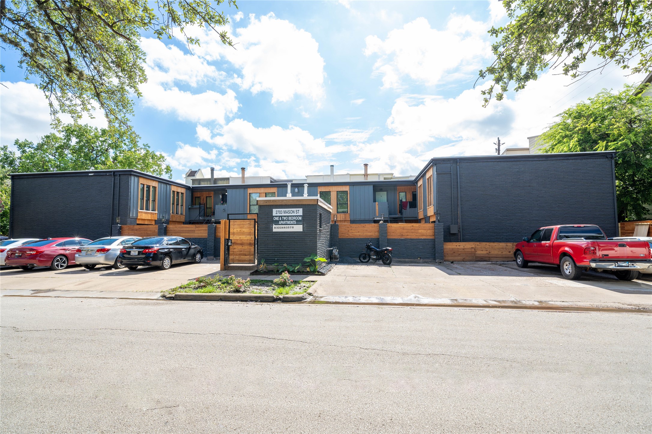 2703 Mason Street, Unit 1BD Houston, TX 77006 - Photo 6 of 19 a cars parked on the side of the road