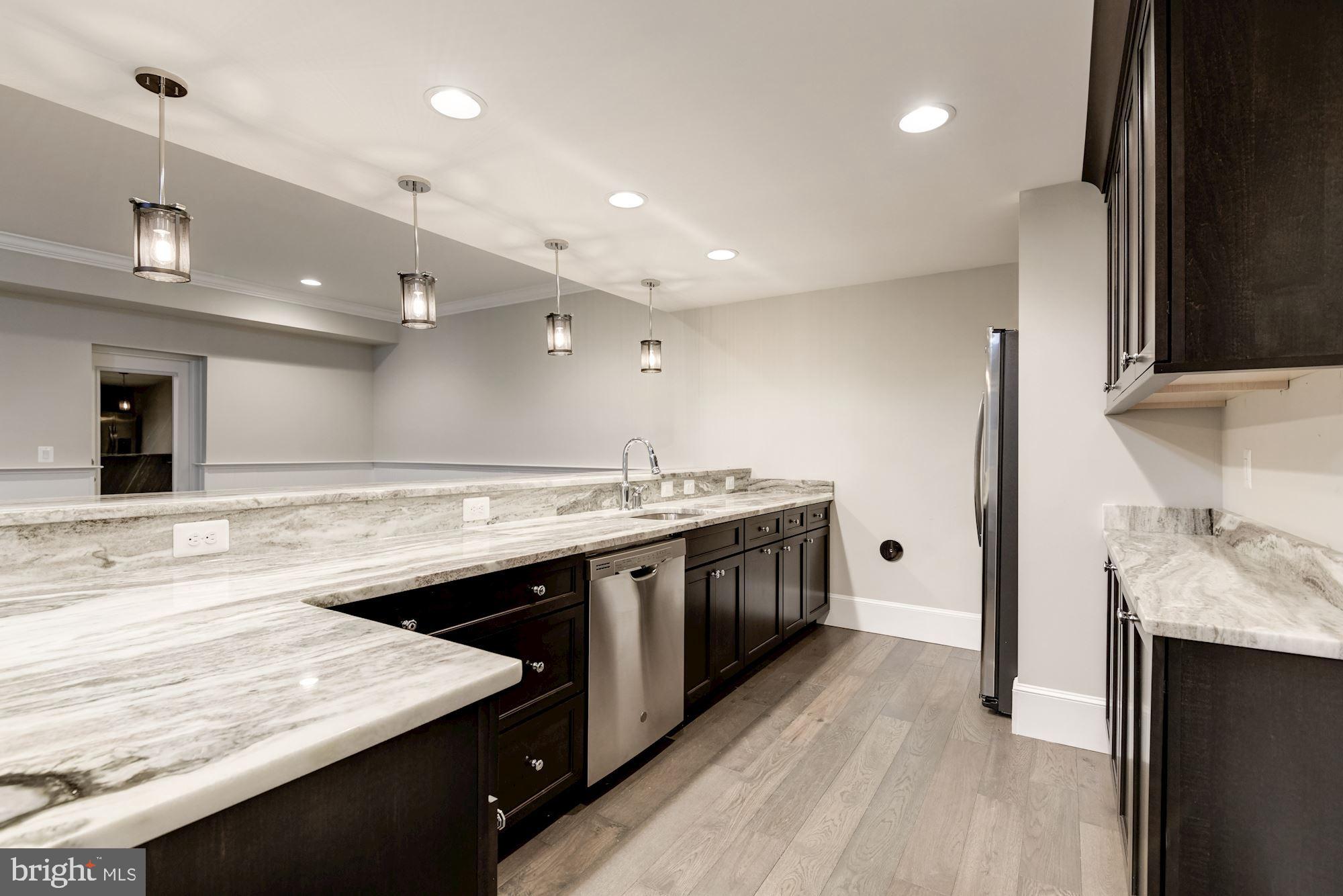 7112 Benjamin Street McLean, VA 22101 - Photo 29 of 32 Lower Level Wet Bar