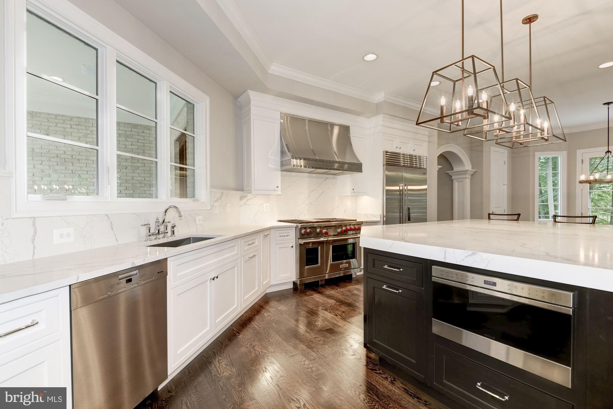 7112 Benjamin Street McLean, VA 22101 - Photo 7 of 32 Glass Cabinetry, Wolf Range and Sub-Zero Frig