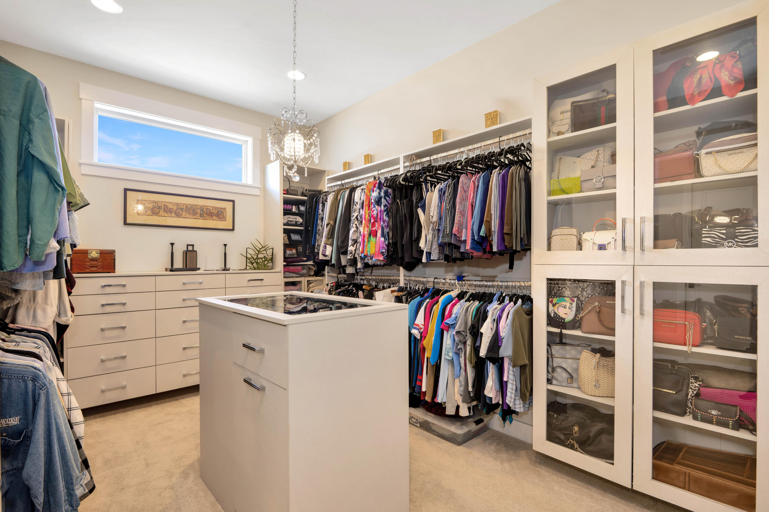 60871 River Rim Drive Bend, OR 97702 - Photo 27 of 42 a view of walk in closet with clothes and shoes
