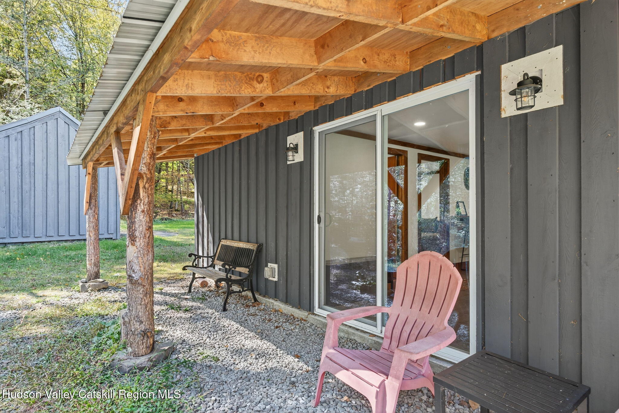 40 Paddock Road East Durham, NY 12423 - Photo 27 of 61 a view of chair and table in patio with wooden fence