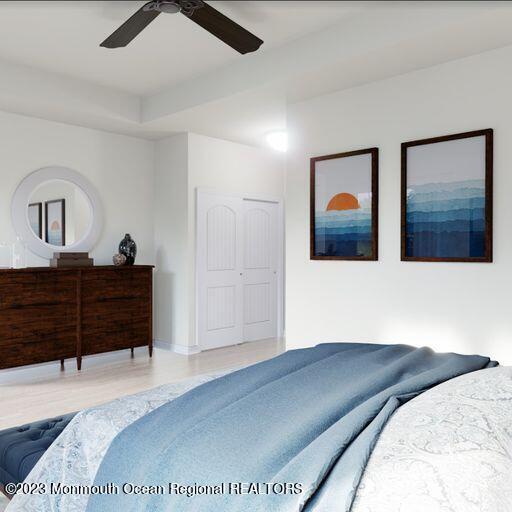 156-58 West Front Street, Unit 15 Keyport, NJ 07735 - Photo 12 of 20 a bedroom with a bed and a painting on the wall
