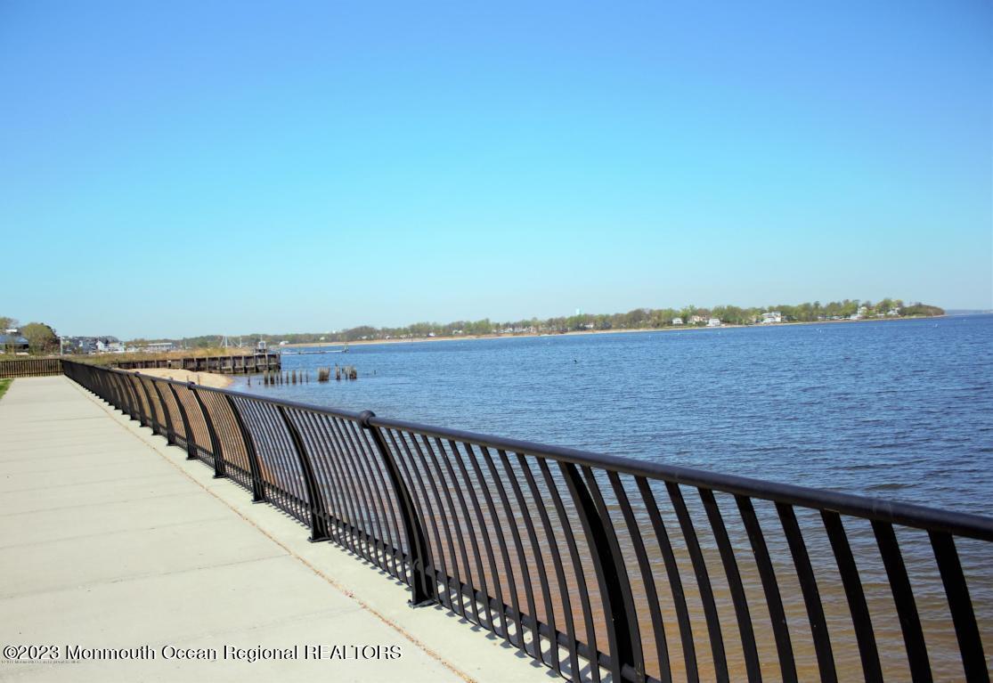 156-58 West Front Street, Unit 15 Keyport, NJ 07735 - Photo 17 of 20 a view of a balcony with wooden floor
