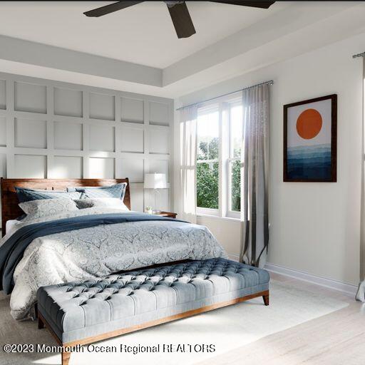 156-58 West Front Street, Unit 15 Keyport, NJ 07735 - Photo 9 of 20 a bed sitting in a bedroom next to a window