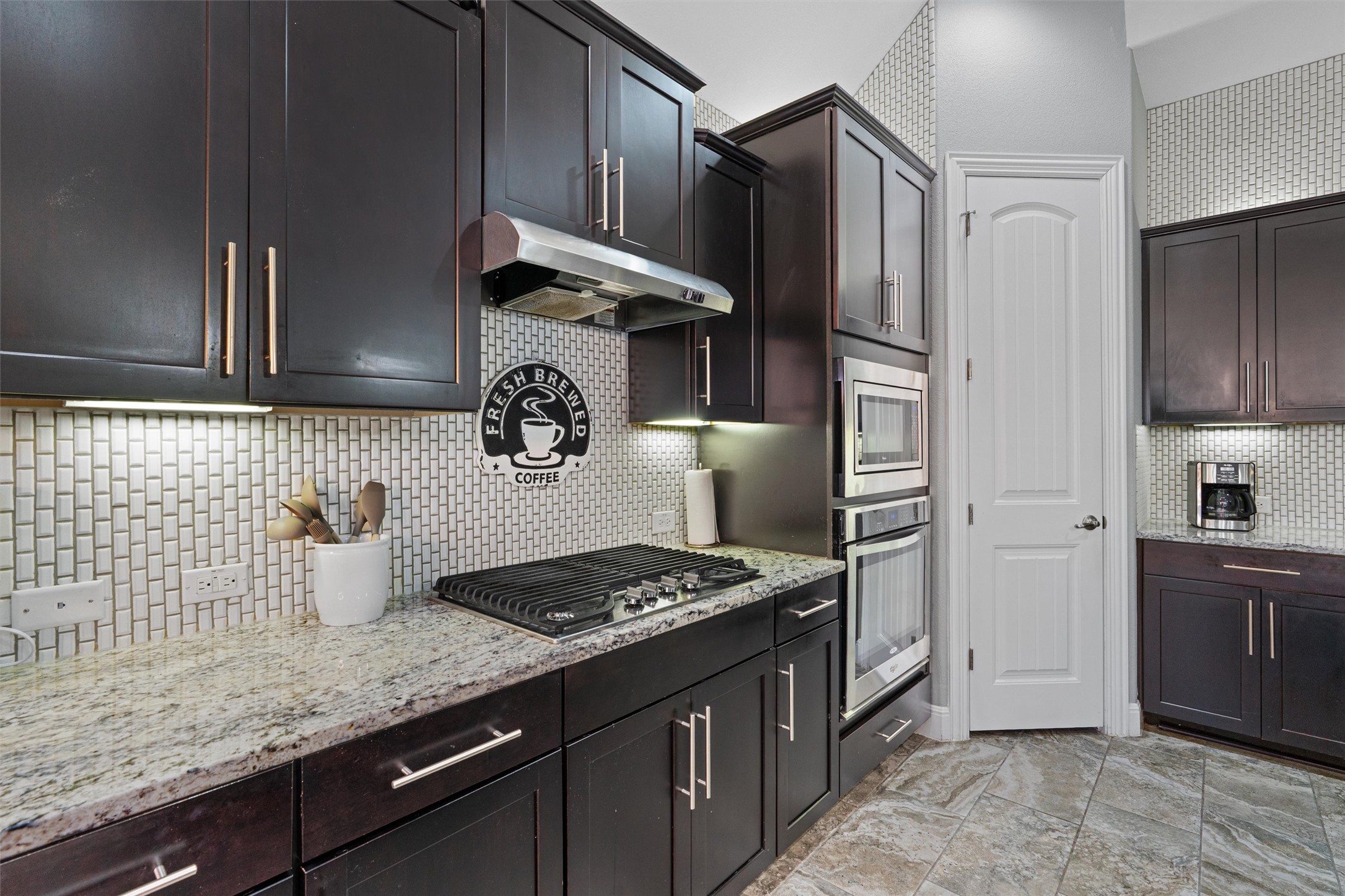 3704 Gildas Path Pflugerville, TX 78660 - Photo 12 of 31 Built-in oven and microwave & gas cooktop