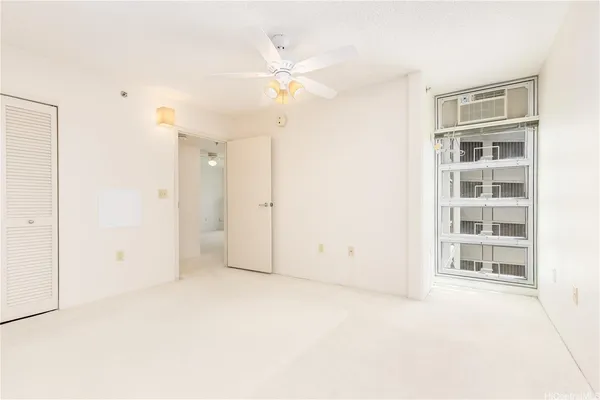a view of a kitchen with a sink dishwasher a refrigerator and a chandelier