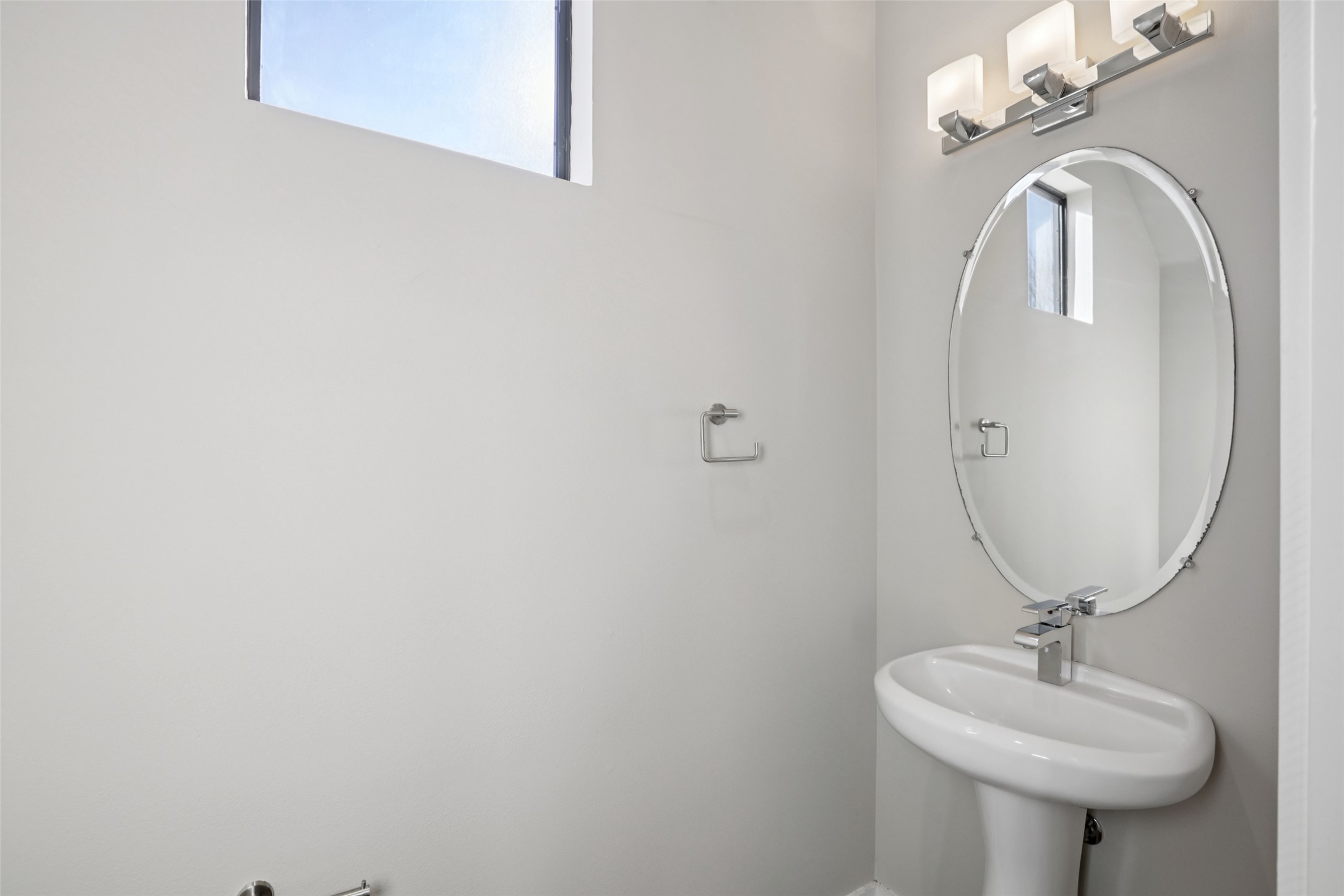 1123 Blair Way Austin, TX 78704 - Photo 10 of 25 a bathroom with a sink and a mirror