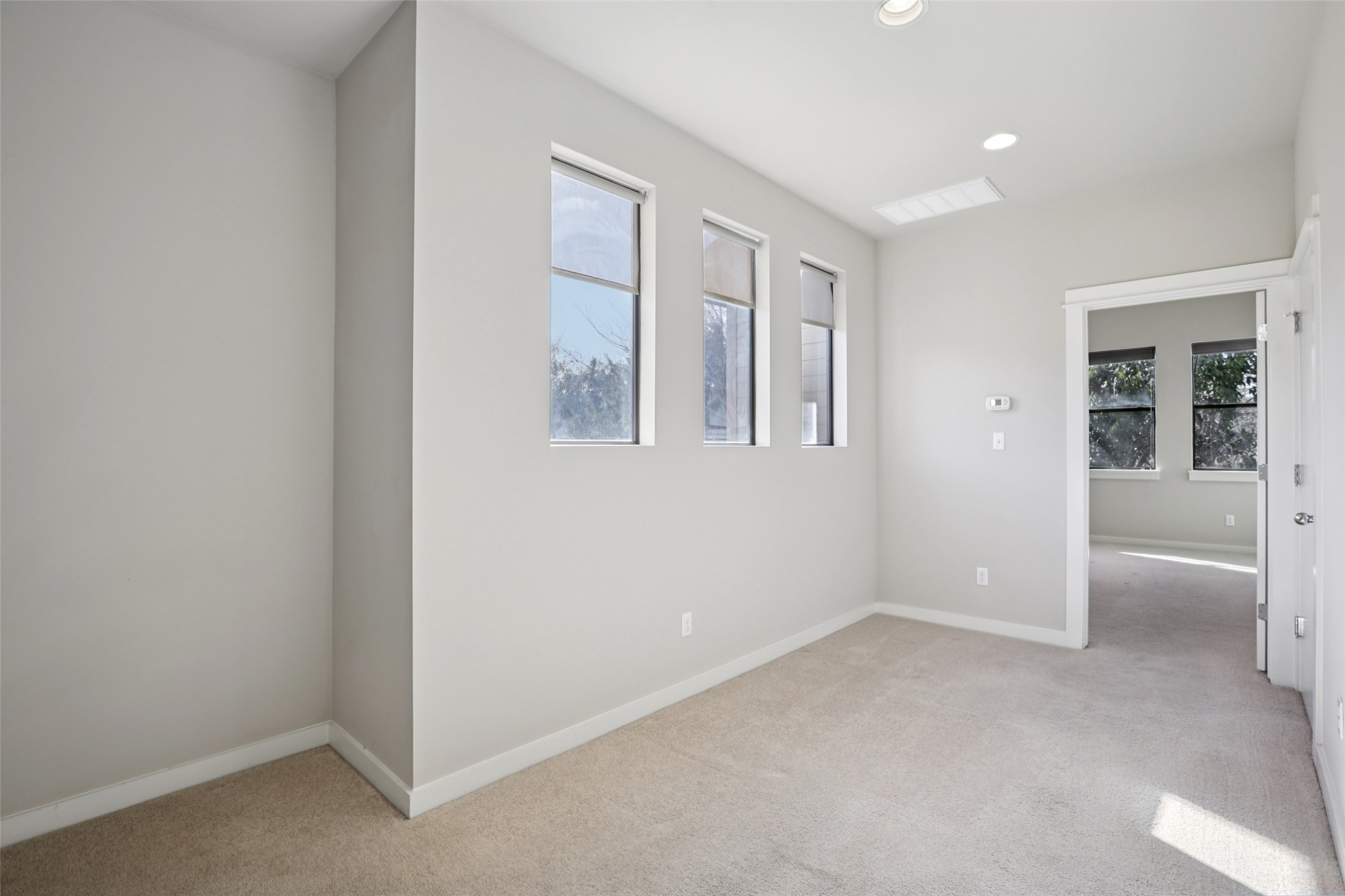 1123 Blair Way Austin, TX 78704 - Photo 11 of 25 an empty room with windows