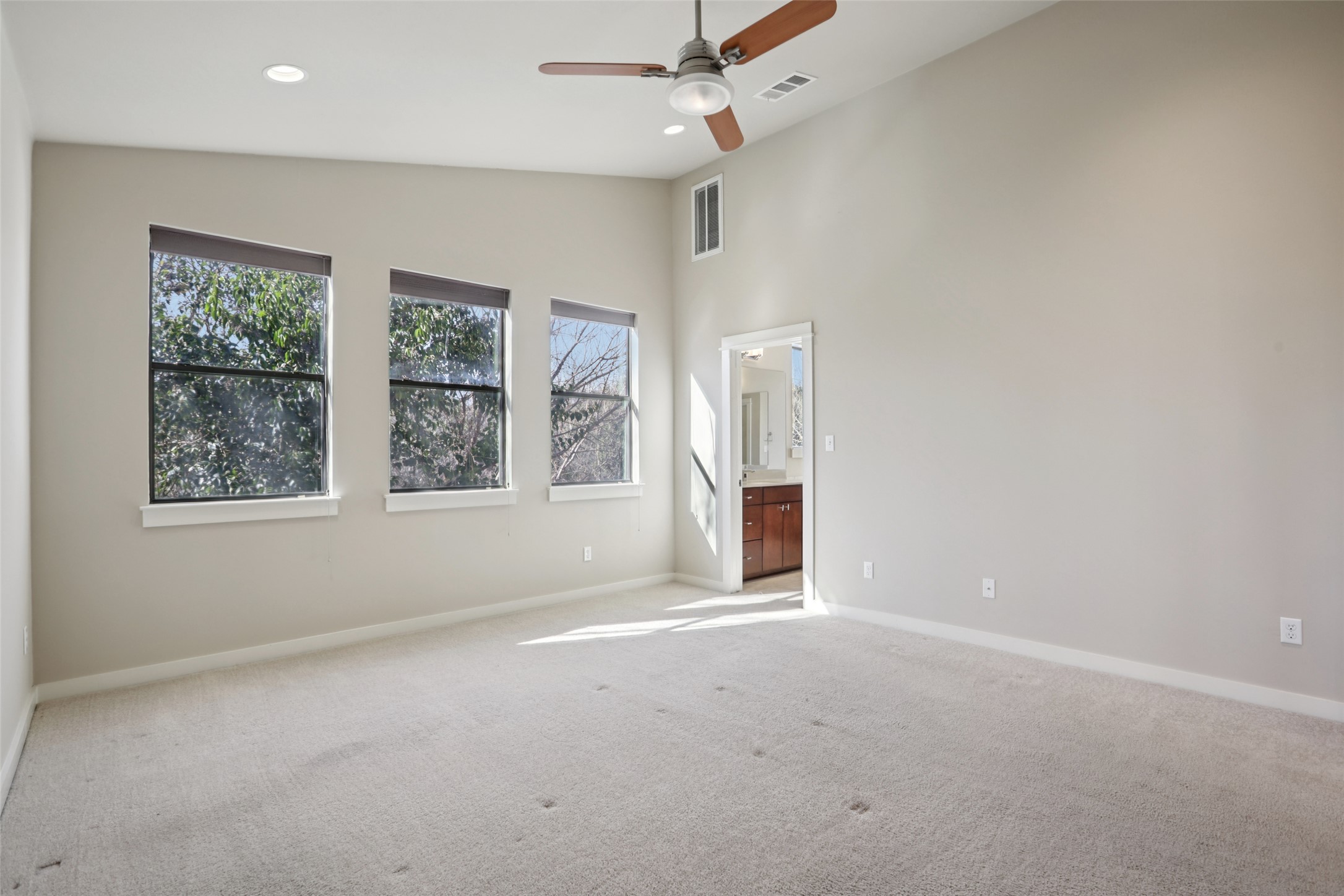 1123 Blair Way Austin, TX 78704 - Photo 14 of 25 an empty room with windows and closet