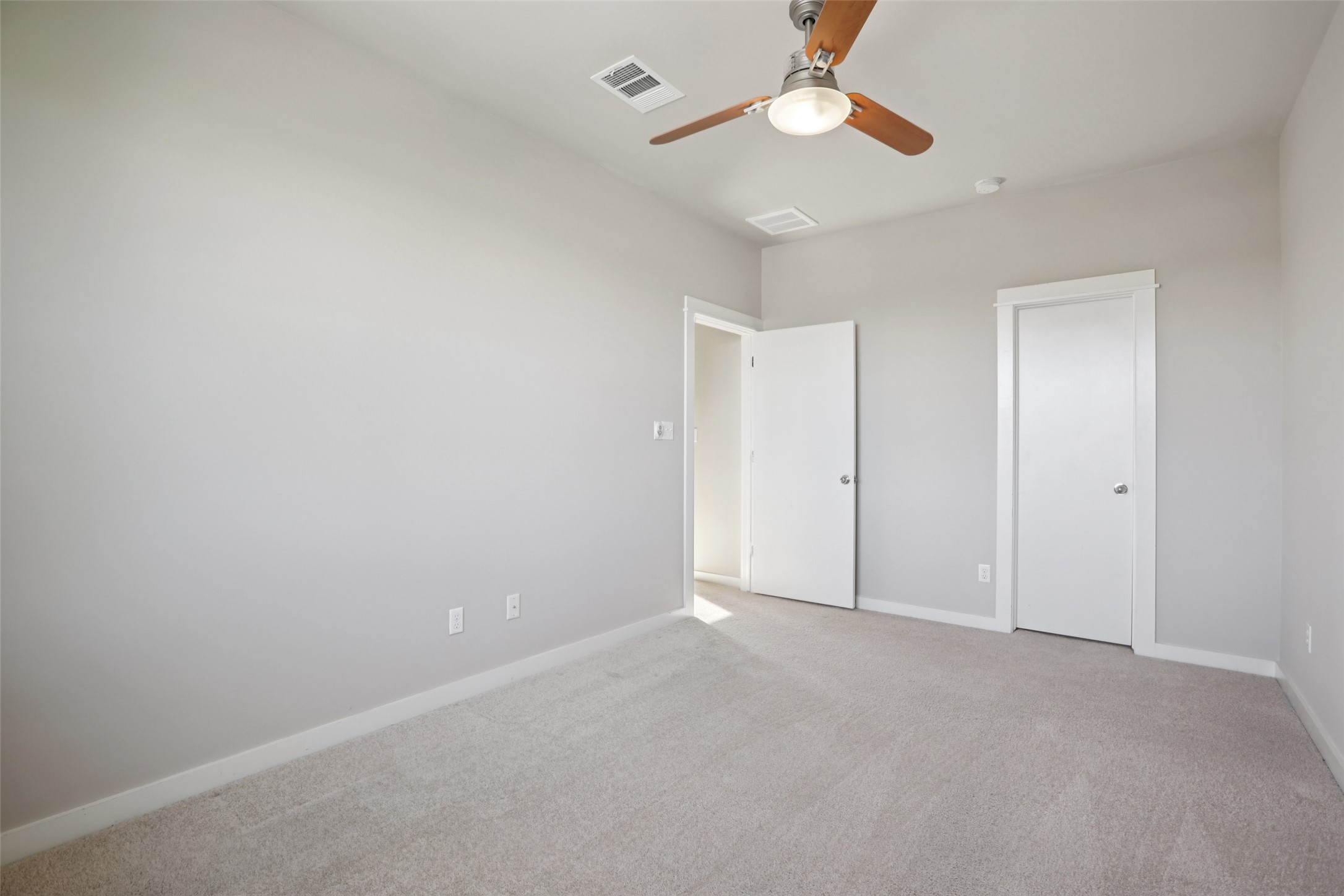 1123 Blair Way Austin, TX 78704 - Photo 25 of 30 Unfurnished bedroom with light carpet and a ceiling fan