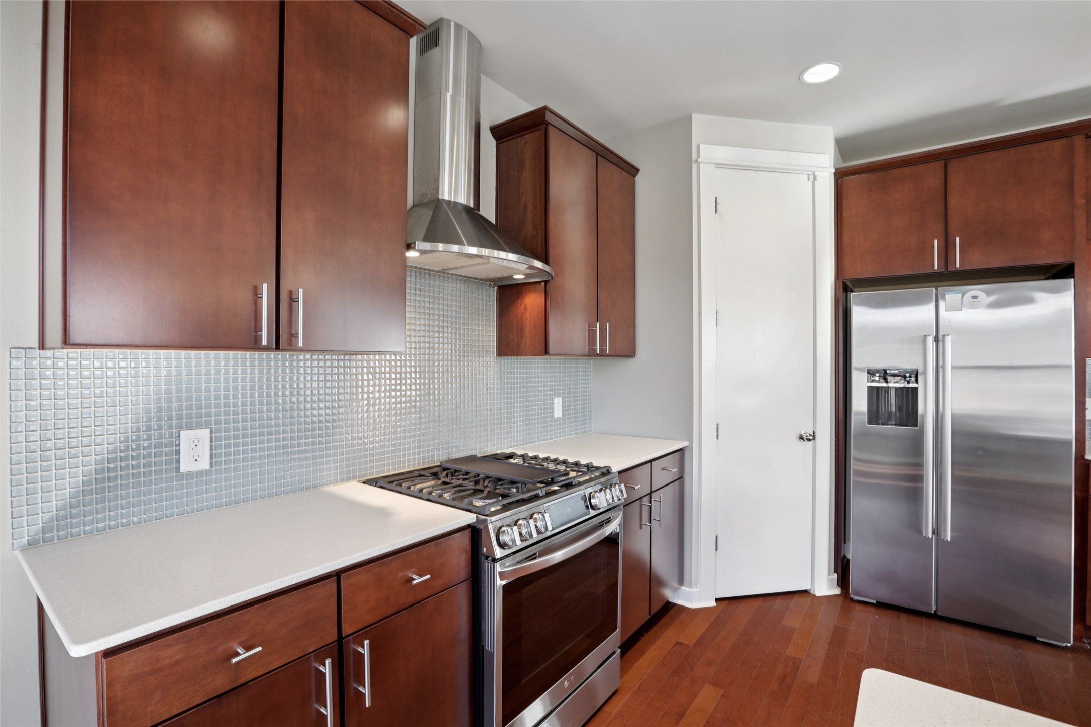 1123 Blair Way Austin, TX 78704 - Photo 7 of 25 a kitchen with a sink stove and refrigerator