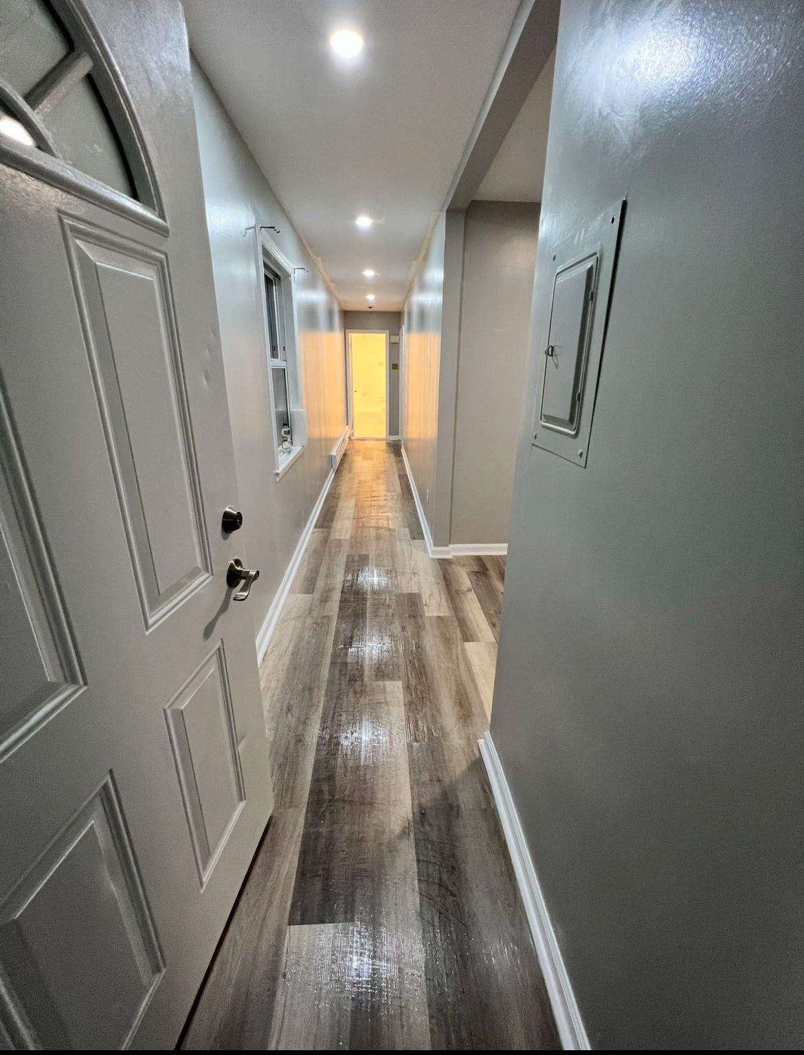 2410 Boston Post Road Larchmont, NY 10538 - Photo 15 of 26 Hallway featuring hardwood / wood-style floors