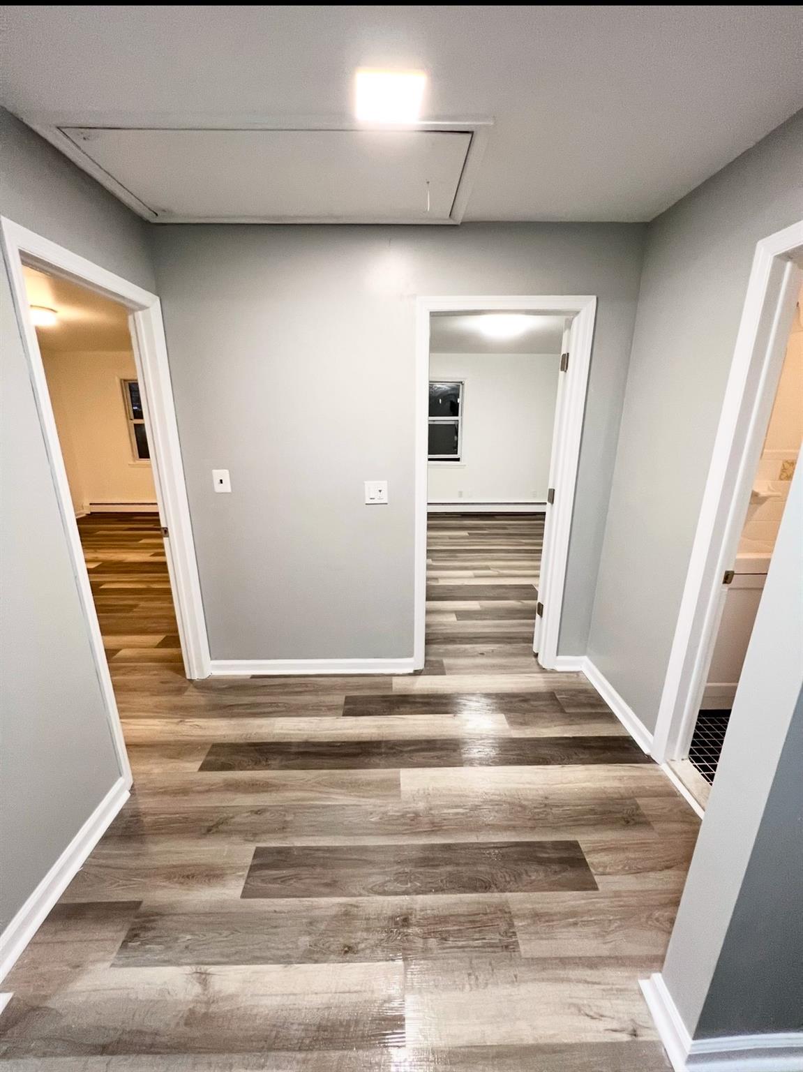 2410 Boston Post Road Larchmont, NY 10538 - Photo 16 of 26 Corridor with dark hardwood / wood-style flooring