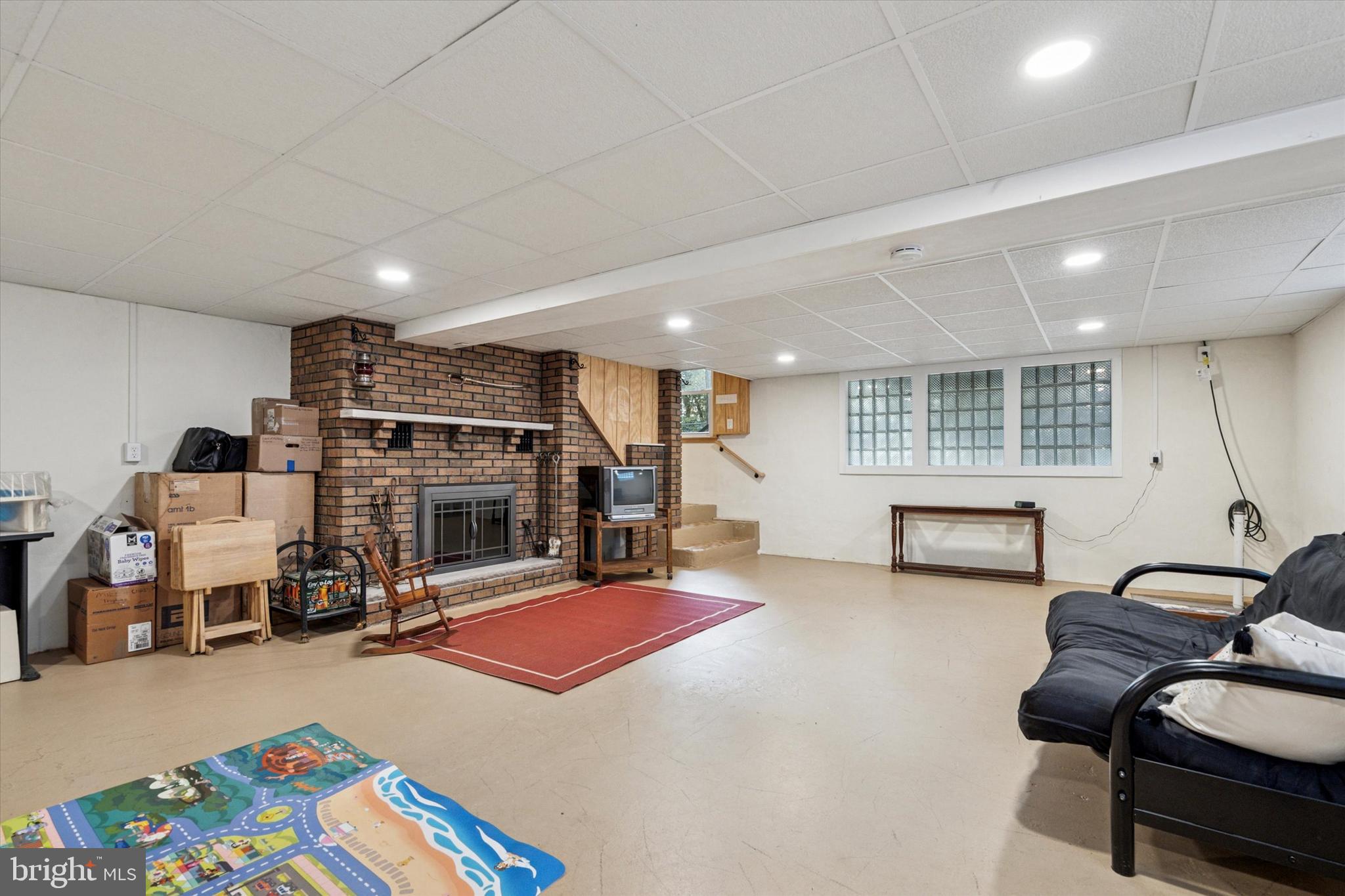 1742 Paradise Lane Bensalem, PA 19020 - Photo 16 of 25 a bed room with furniture and a flat screen tv