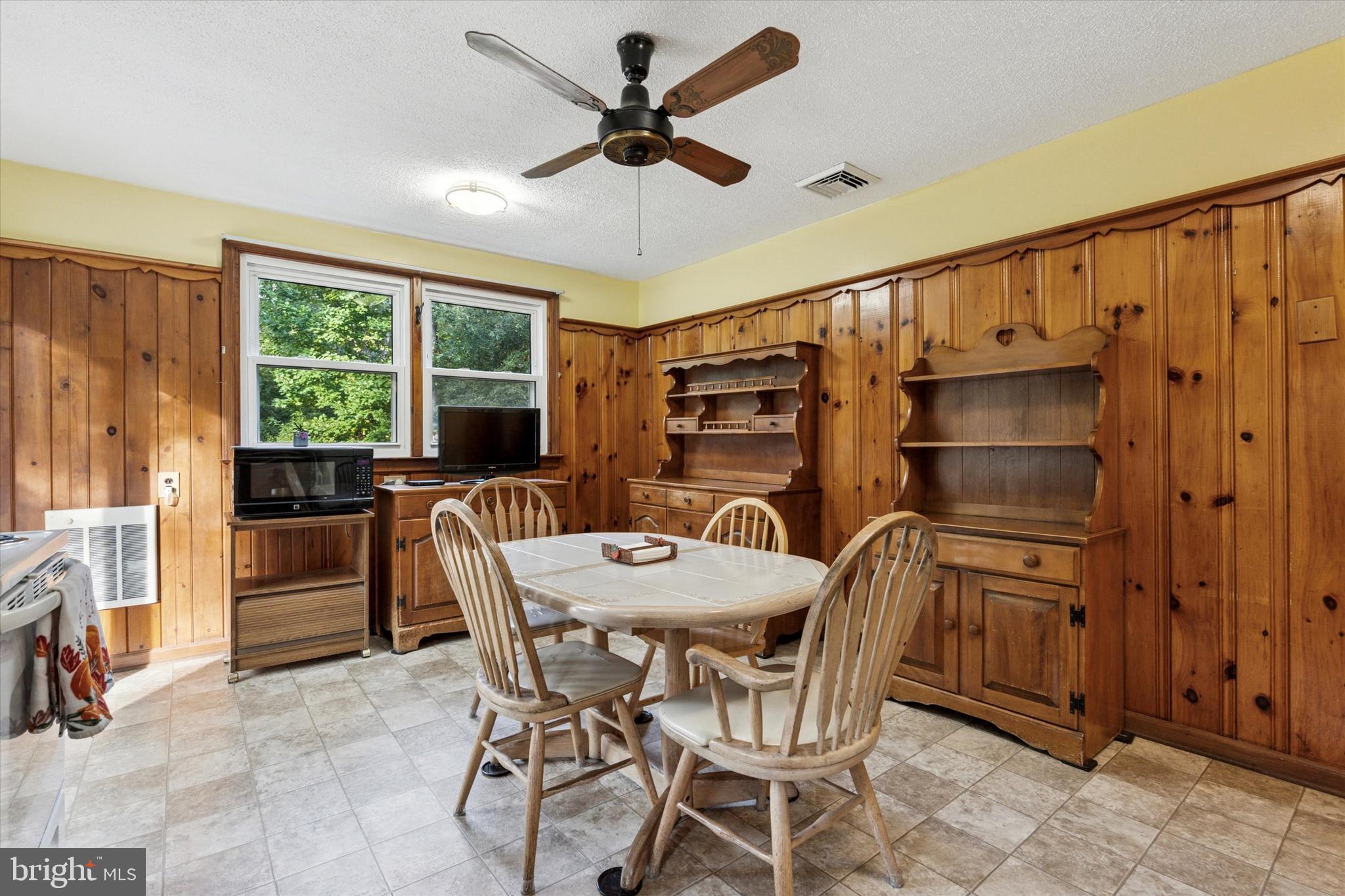 1742 Paradise Lane Bensalem, PA 19020 - Photo 7 of 25 a dining room with furniture and window