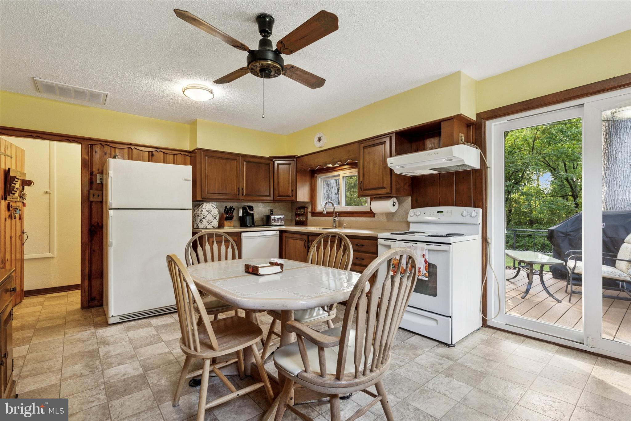 1742 Paradise Lane Bensalem, PA 19020 - Photo 9 of 25 a view of a dining room with furniture window and outside view
