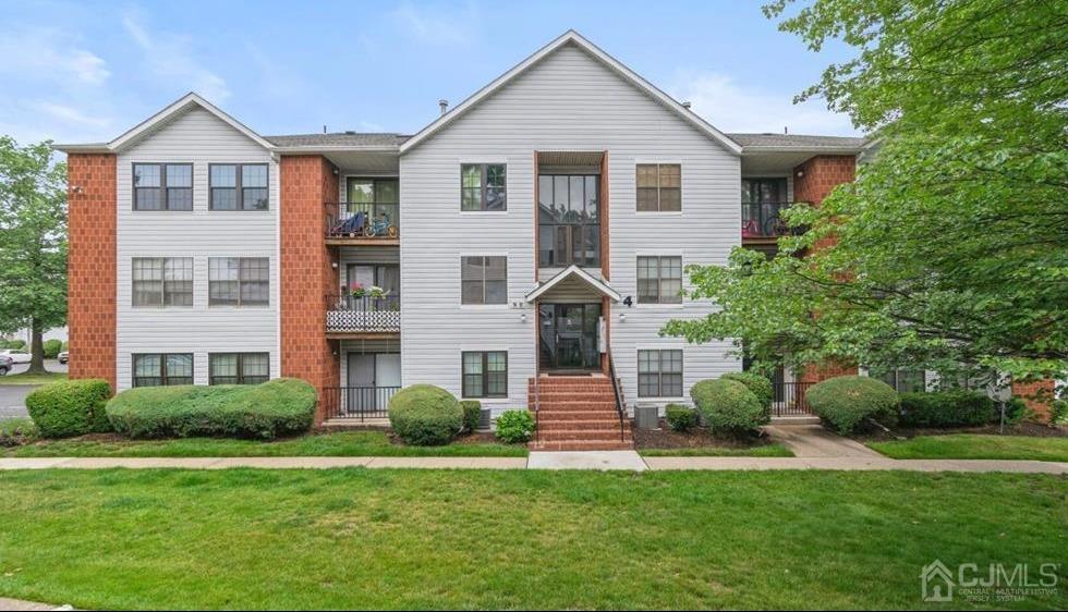 40 Boulder Drive Edison, NJ 08817 - Photo 2 of 23 a front view of a house with a yard