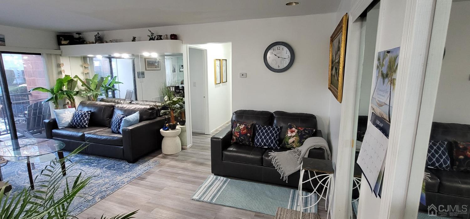 40 Boulder Drive Edison, NJ 08817 - Photo 23 of 23 a living room with furniture and a fireplace
