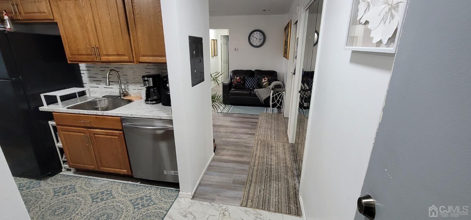 40 Boulder Drive Edison, NJ 08817 - Photo 3 of 23 a kitchen with a refrigerator and a stove