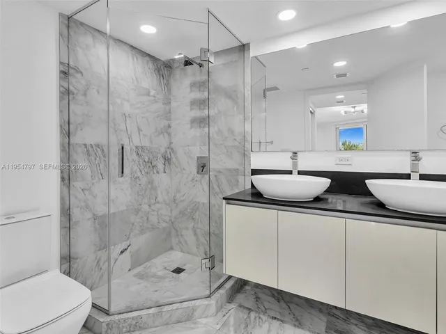 a bathroom with a sink and a bathtub