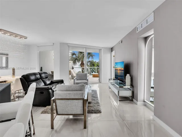 a living room with furniture and a couch