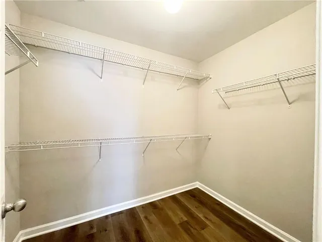 a view of a room with racks on the wall