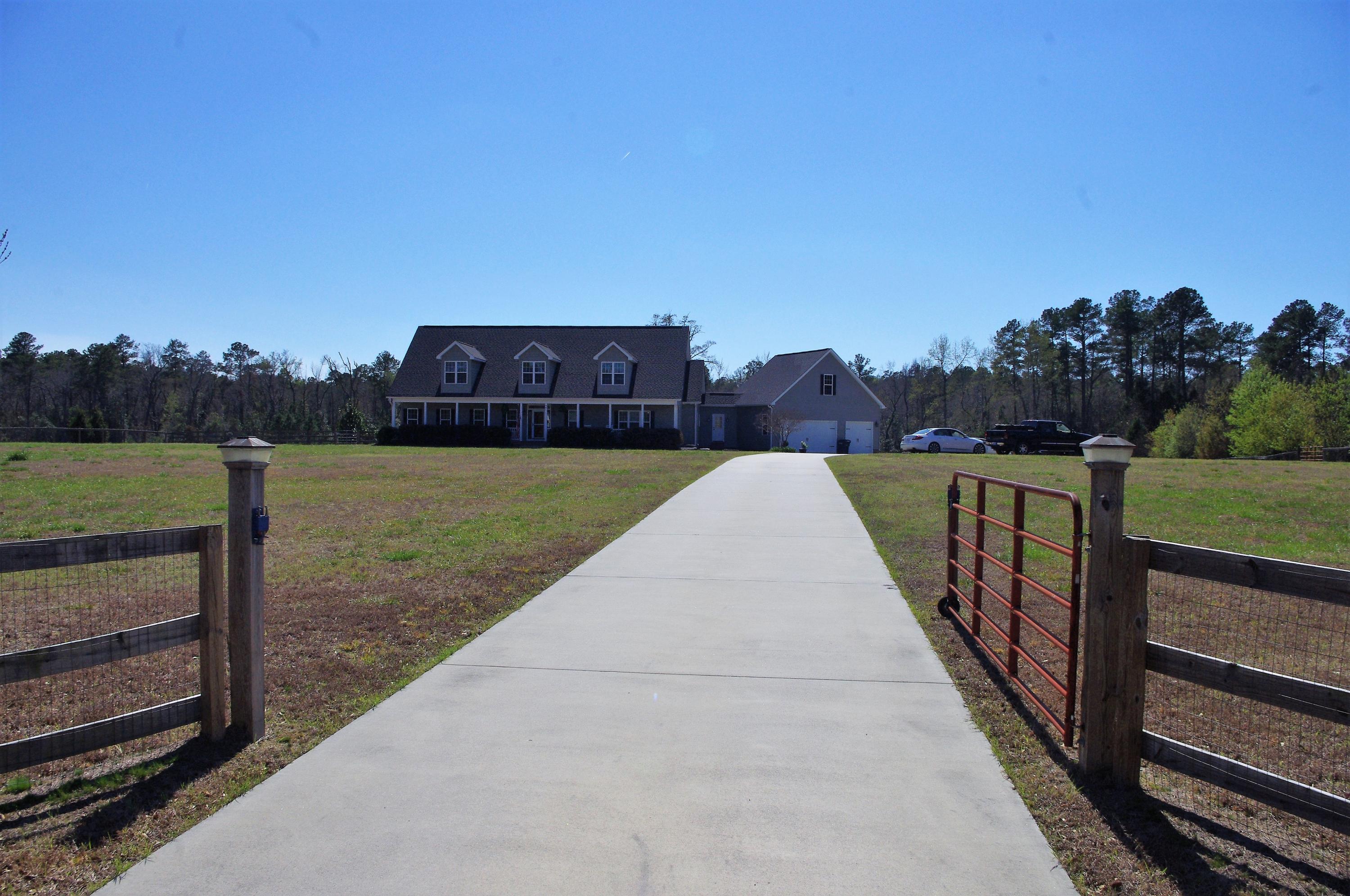 981 Lakebay Road Vass, NC 28394 - Photo 26 of 28 Concrete Drive with manual gate