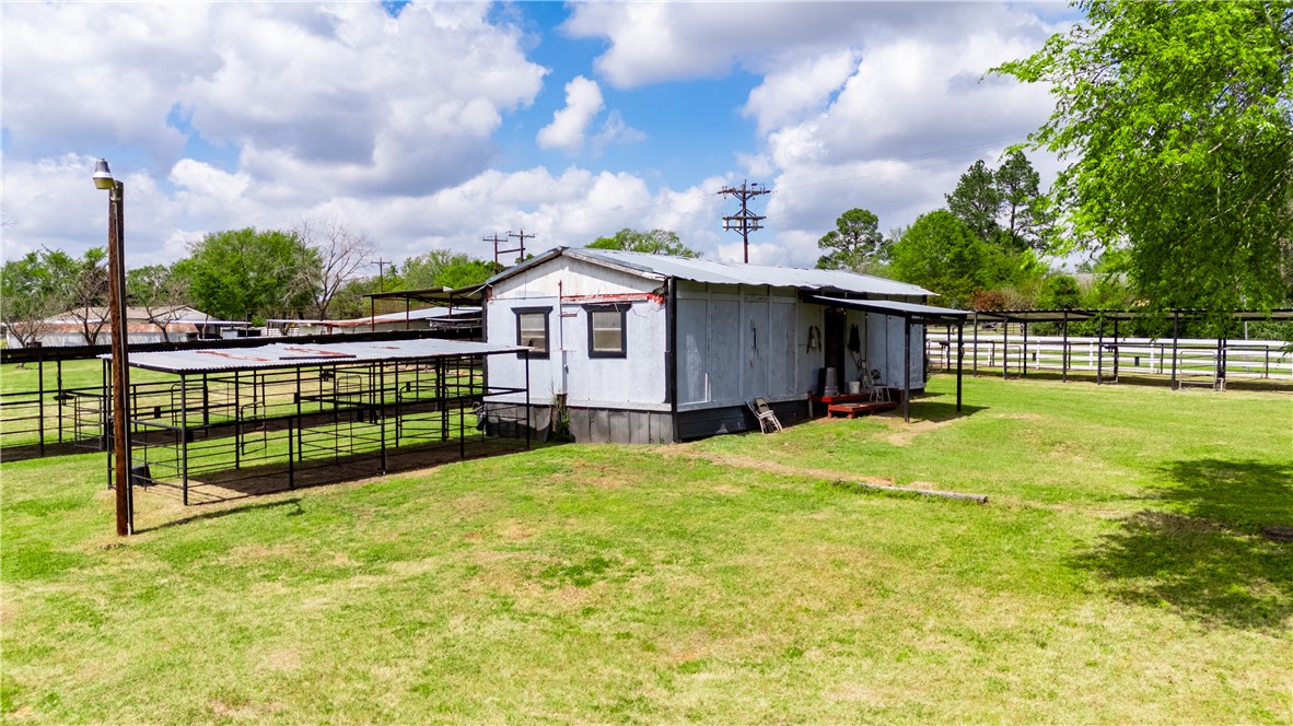 10084 Fm 831 Buffalo, TX 75831 - Photo 33 of 50 a view of a house with a backyard and a garden