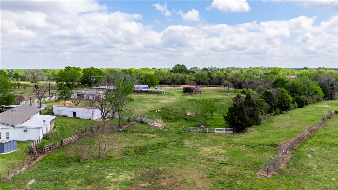10084 Fm 831 Buffalo, TX 75831 - Photo 49 of 50 a view of a garden with a building in the background