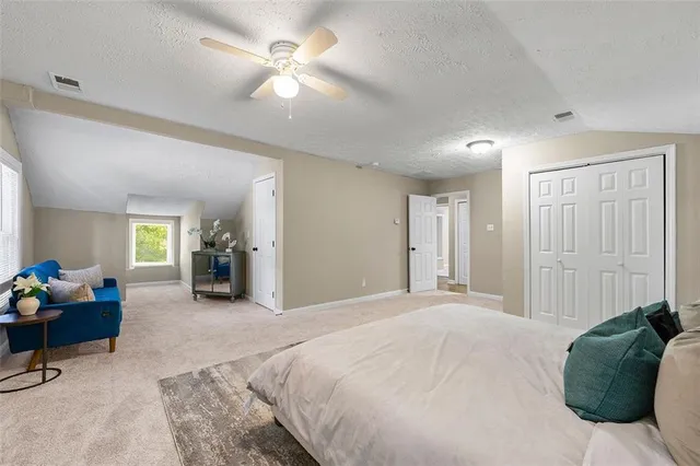 a bathroom with a sink a toilet and bathtub