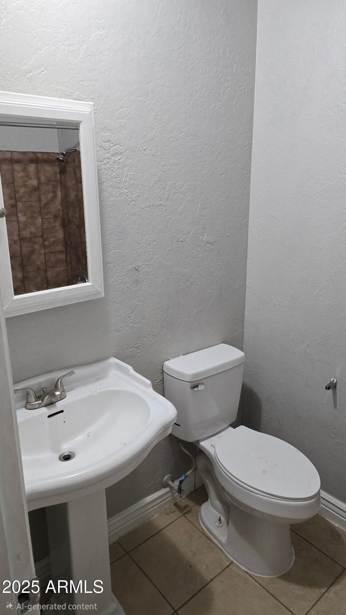 8413 East Coronado Road, Unit 2 Scottsdale, AZ 85257 - Photo 3 of 6 a white toilet sitting next to a bathroom sink