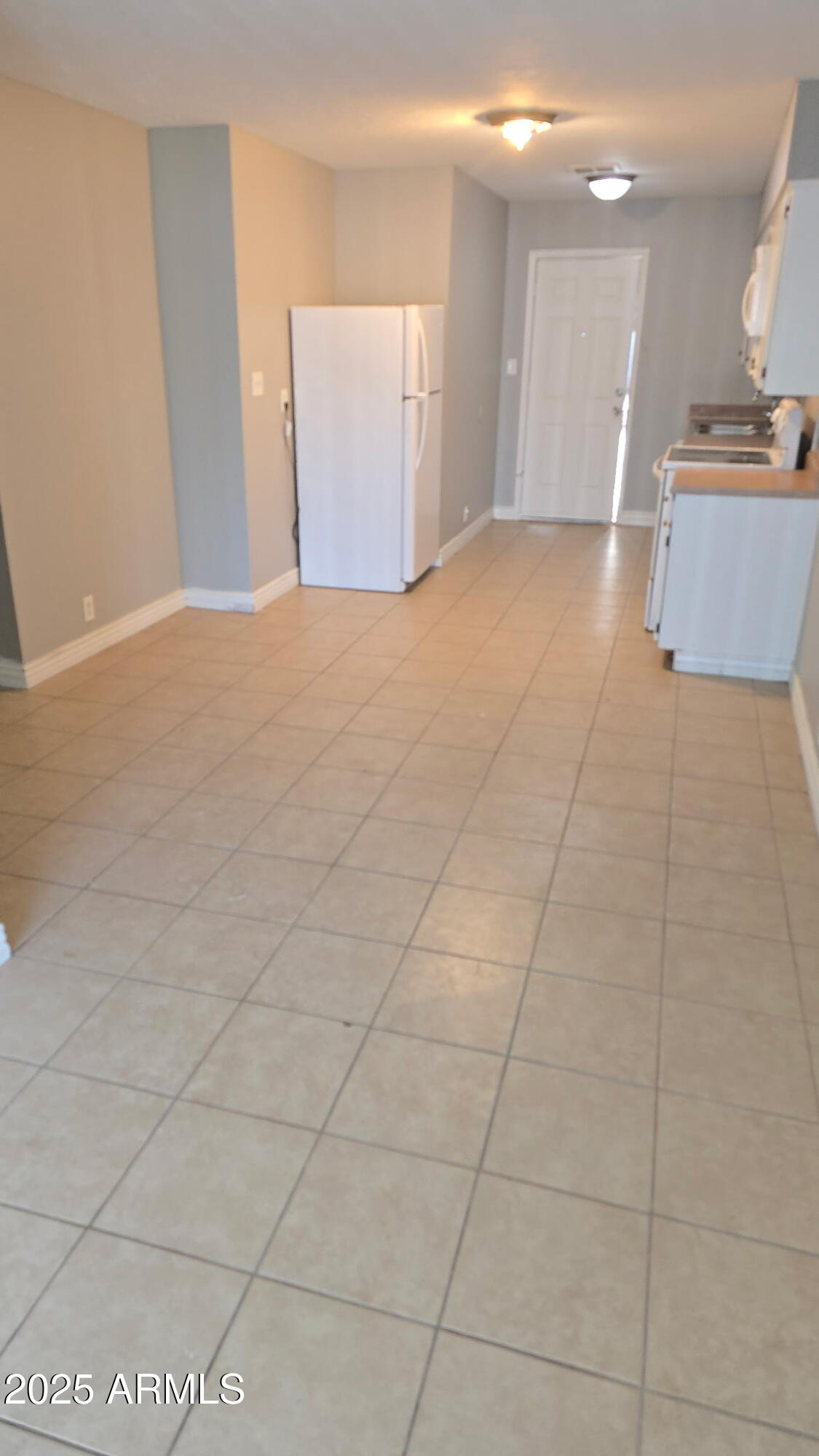 8413 East Coronado Road, Unit 2 Scottsdale, AZ 85257 - Photo 6 of 6 a view of an empty room and window