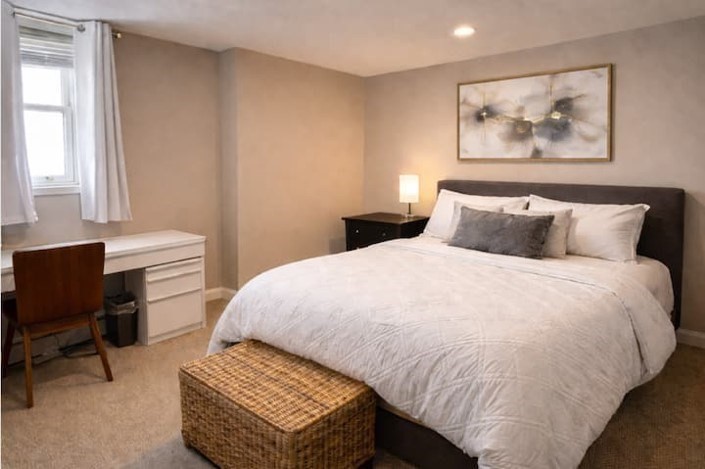 749 Worcester Street Wellesley, MA 02481 - Photo 7 of 17 a bedroom with a bed and a desk